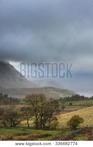 Stunning Autumn Fall Landscape View Along Valley Towards Mellbreak And Grasmoor In Lake District Wit