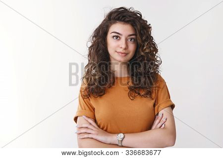 Young Determined Armenian Curly-haired Female University Student Listen Carefully Asignment Look Con