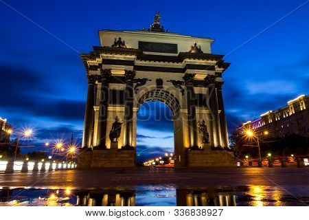 Arc De Triomphe In The Light Of The Evening City Lights. Russia Moscow