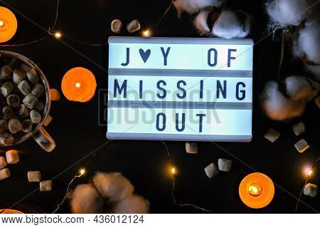 Lightbox With Text Jomo Joy Of Missing Out. The Concept Of Relaxation From Information And Gadgets. 