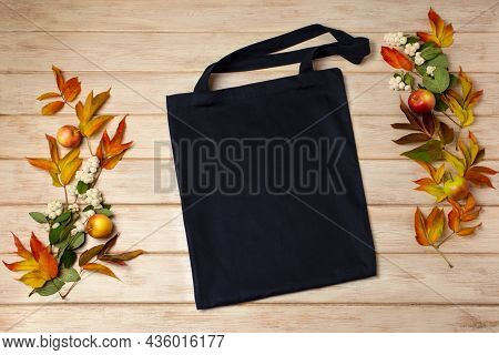 Black Tote Bag Mockup With Fall Leaves And Snowberry