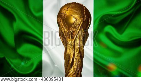 October 6, 2021, Abuja, Nigeria. Fifa World Cup On The Background Of The Flag Of Nigeria.