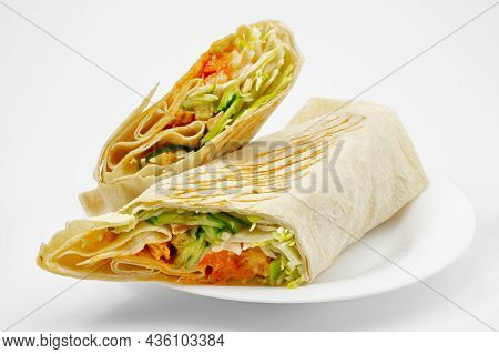 Gyros Food Or Shawarma Or Doner Kebab On White Plate Isolated On White Background. Two Crossed Parts