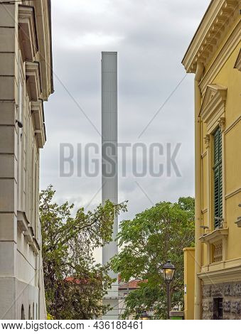 Obelisk Landmark Non Aligned Movement Pillar View Between Buildings In Belgrade