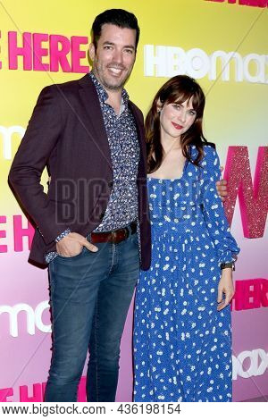 LOS ANGELES - OCT 8:  Jonathan Scott, Zooey Deschanel at the 