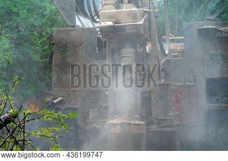 Crawler Drilling Rig Drills A Well, A Lot Of Dust When Drilling A Borehole