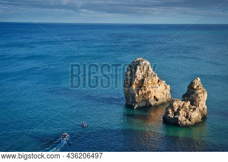 Photo Of The Rocks And Natural Arches On Algrave Portugal