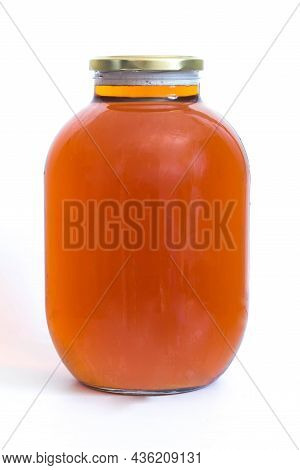 Three Liters Of Homemade Beer In A Glass Jar