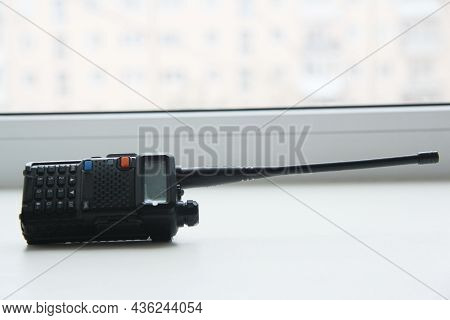 The Radio Lies Sideways On The Window