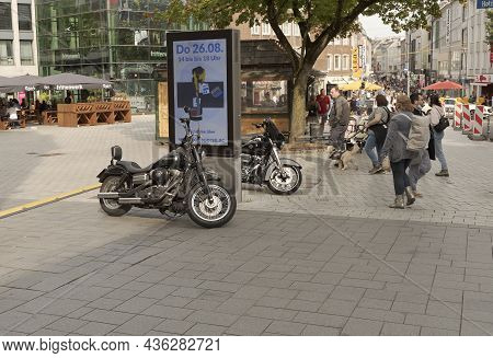 Aachen. Cologne - Germany 24-08-2021. Two Motorcycles Parked In The Pedestrian Area. Сomfortable In 