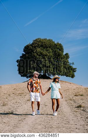 Couple Man And Woman On Vacation In Italy Toscane Watching The Golden Hills Of Toscane In Italy Euro