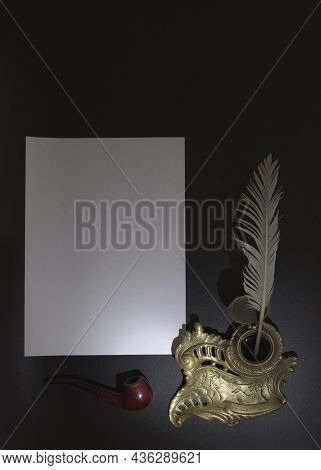 Decorative Inkwell, Feather On A Black Background. Stylization Of Antique Writing Instruments. Copis
