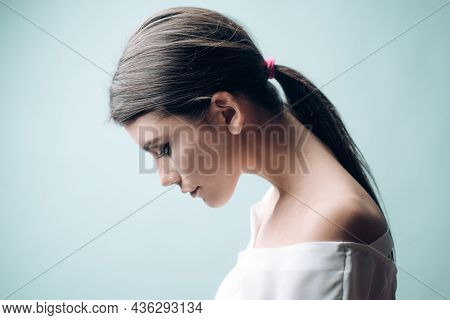 Thinking Woman Looking Down. Problems Solution. Overthinking Girl.