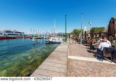 Cisano, Italy - May 26, 2021: Port Of The Small Village Of Cisano Di Bardolino With Many Boats Moore