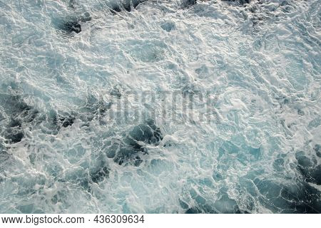 Aerial View Ocean Water Surface With Waves. White Water Background