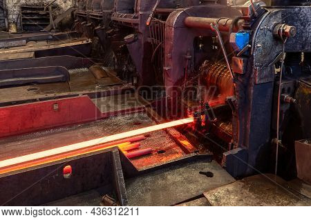 The Process Of Rolling Hot Rolled Steel In A Rolling Mill.