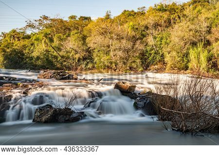 Capela Do Rosario Dam With Cadeia River And Forest