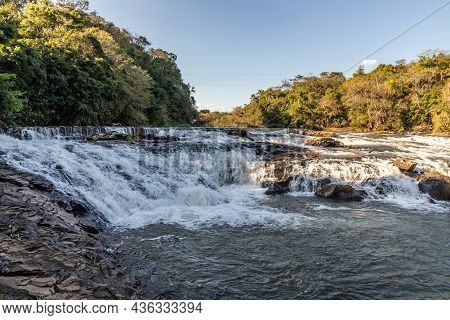 Capela Do Rosario Dam With Cadeia River And Forest