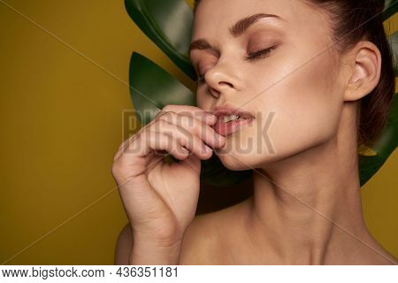 Attractive Woman Clean Skin Palm Leaf Cosmetics Spa Treatments