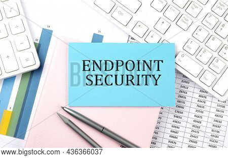 Endpoint Security Text On Blue Sticker On Chart With Calculator And Keyboard,business