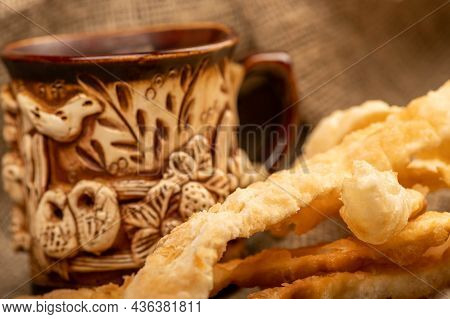Fried Bread Sticks With Salt And A Ceramic Mug, Close-up, Selective Focus