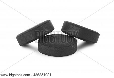 Activated Charcoal Pills On White Background. Potent Sorbent