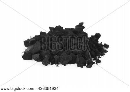 Pile Of Crushed Activated Charcoal Pills On White Background. Potent Sorbent