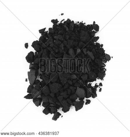 Pile Of Crushed Activated Charcoal Pills On White Background, Top View. Potent Sorbent
