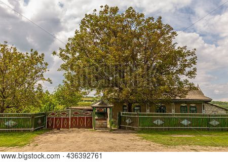View Of The Buildings And The Gravel Road In The Village Of Gradiste In Gagauzia, Republic Of Moldov