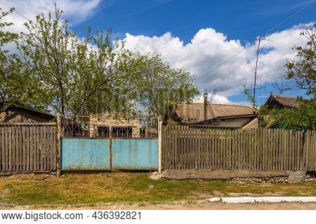 View Of The Buildings And The Gravel Road In The Village Of Gradiste In Gagauzia, Republic Of Moldov