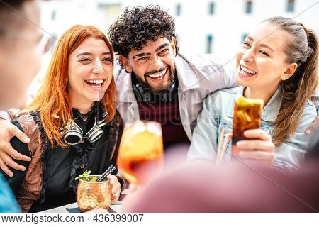 Young People Having Fun Drinking At Open Air Bar After Work - Life Style Concept With Trendy Guys An