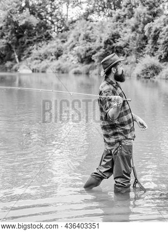 The Best Time To Go Fishing. Summer Weekend. Big Game Fishing. Mature Man Fly Fishing. Man Catching 