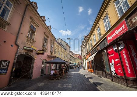 Zagreb, Croatia - June 19, 2021: Radiceva Ulica Street With People Passing By Crowded Restaurants, C