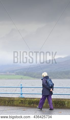 Greenock, Inverclyde, Scotland, Uk, October 2nd 2021, Elderly Women Walking In Heavy Rain During Bri