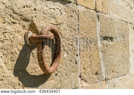 Close-up Of A Rusty Metal Solvent With Shadow On Sunny Day