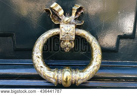 European Vintage Old Metal Wrought Iron Door Knocker. Design Detail. Paris.