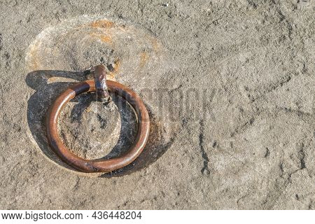 Close-up Of A Rusty Metal Solvent At A Stone