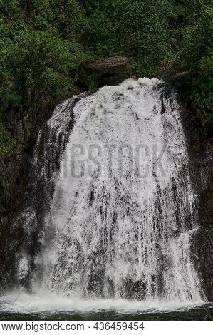 Estyube Waterfall At Lake Teletskoye In The Altai Mountains.