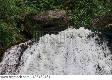 Estyube Waterfall At Lake Teletskoye In The Altai Mountains.