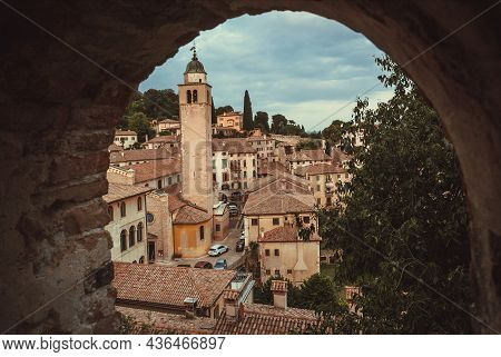 Asolo, Italy: Ancient Arches Of A Small Town Near Treviso, With Towers And Historical Brick Houses A