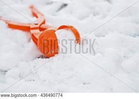A Tool For Modeling And Making Snowballs From Snow For Children's Winter Games. Kid Winter Games Wit