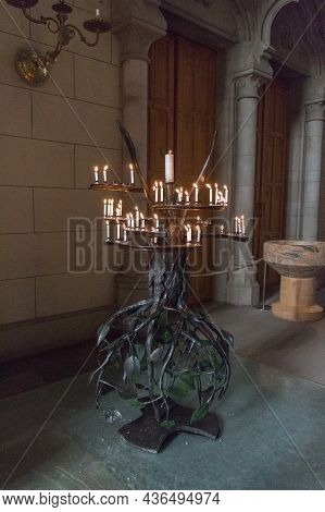 Sweden, Uppsala - April 19 2019: Detailed View Of Uppsala Cathedral Interior, Iron Candle Holder On 
