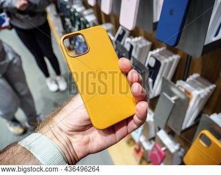 Paris, France - Sep 24, 2021: Pov Male Hand Holding Silicone Protection Case With Magsafe Charging F