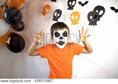 Halloween Celebration Concept. The Boy In Spooky Make-up.