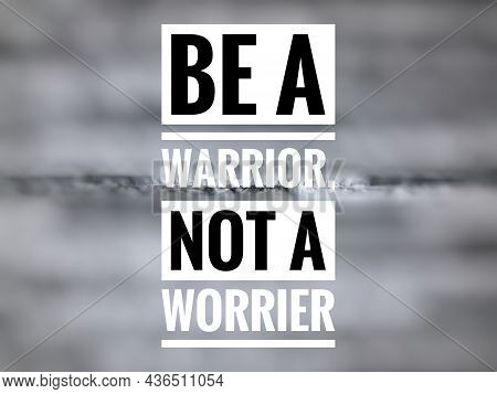 Motivational Quote Written With Phrase Be A Warrior, Not A Worrier. Blurred Background