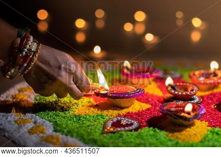 Traditional Diya Lamps Lit During Diwali Celebration