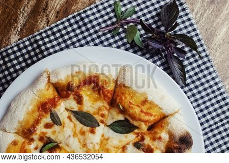 Close-up Of Margarita Pizza In A Disposable Dish. Top View Of Takeaway Food In A Fast Food Cafe. On