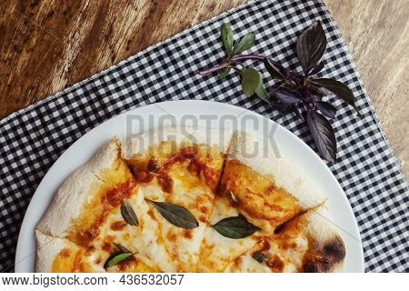 Close-up Of Margarita Pizza In A Disposable Dish. Top View Of Takeaway Food In A Fast Food Cafe. On