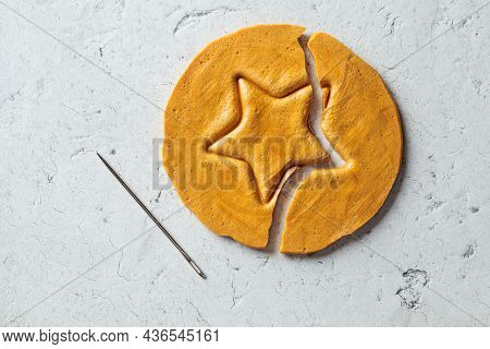 Dalgona Candy - South Korean Treat. Round Sugar Cookie With A Star Inside, Top View.