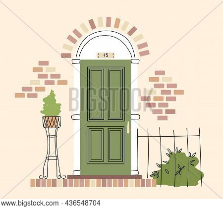 Retro-vintage Front Door. Brick Wall. The Exterior Of The House. Entrance To The House. A Pot Of Her